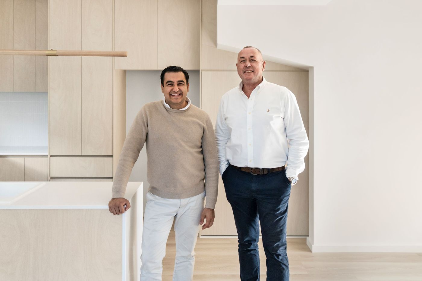 Cartesian advisors walking a client through a new property